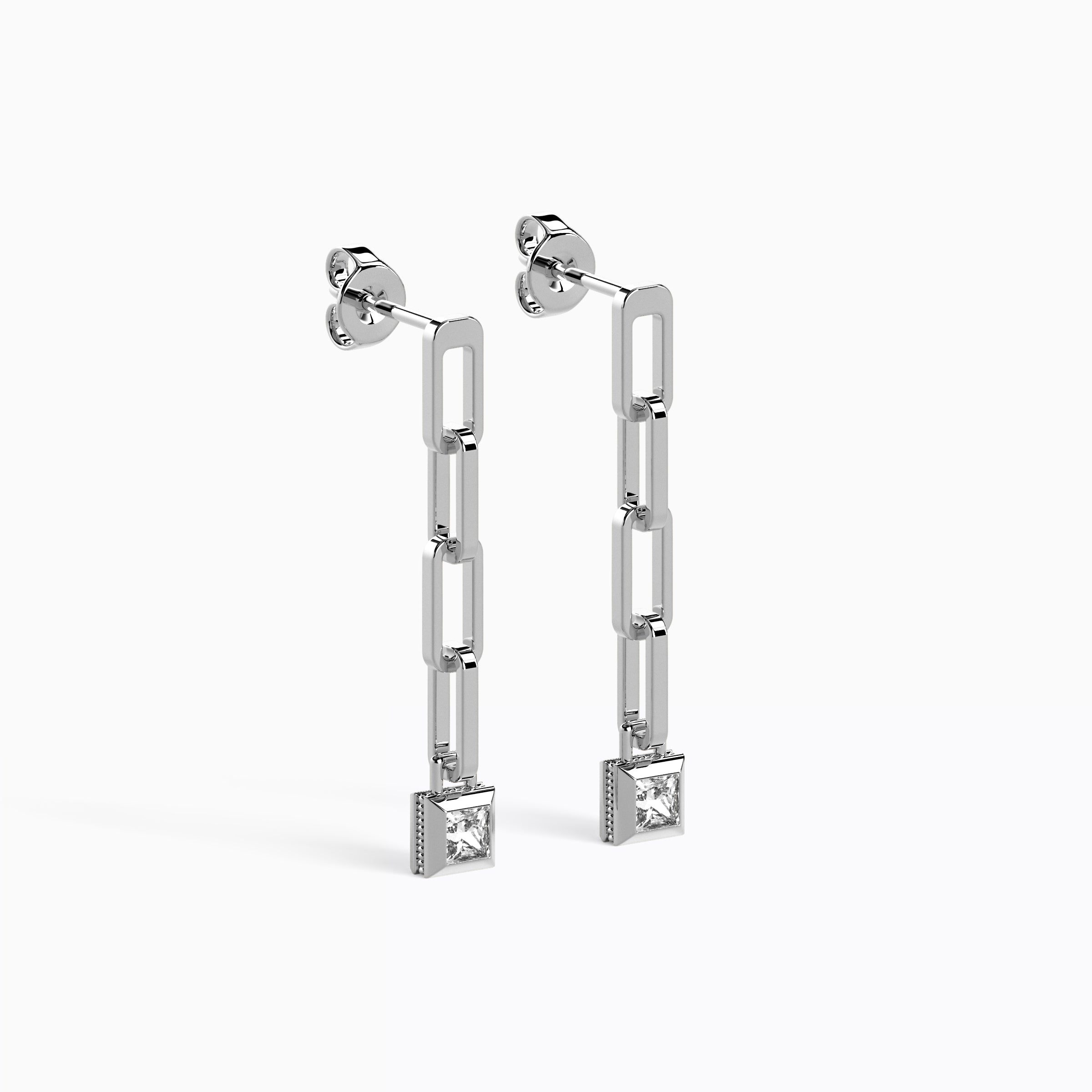 Boucles d'oreilles pendantes en forme de trombone serties de diamants | Platine