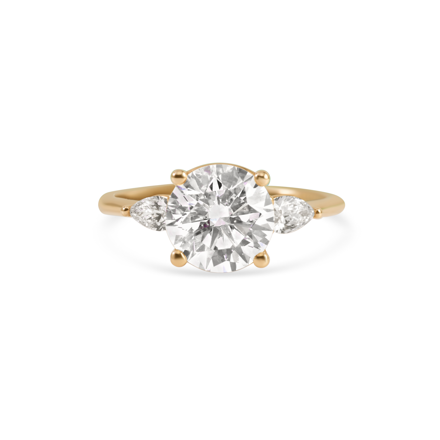 Three-stone round and pear diamond engagement ring | 14K Gold