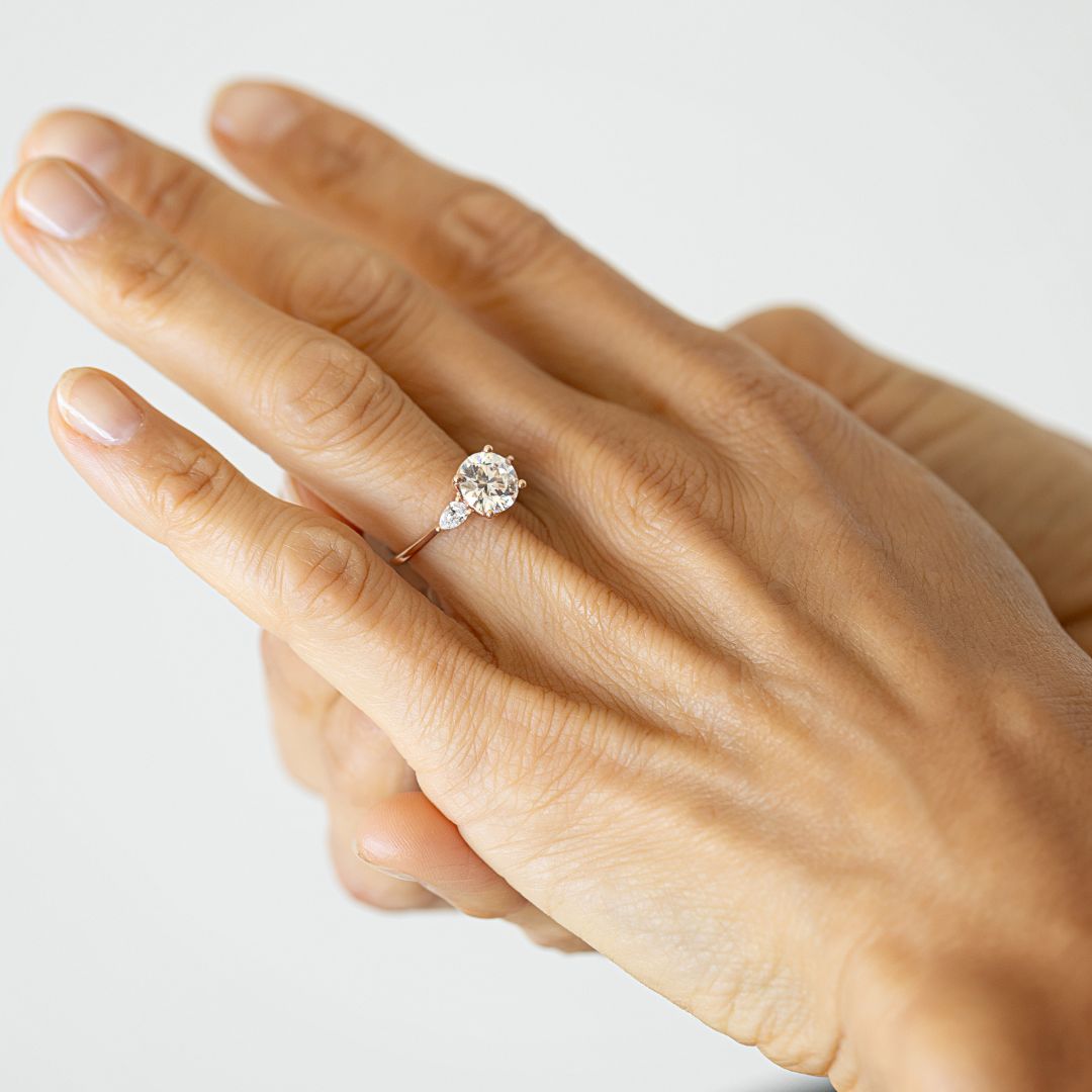 Three-stone round and pear diamond engagement ring | 14K Gold